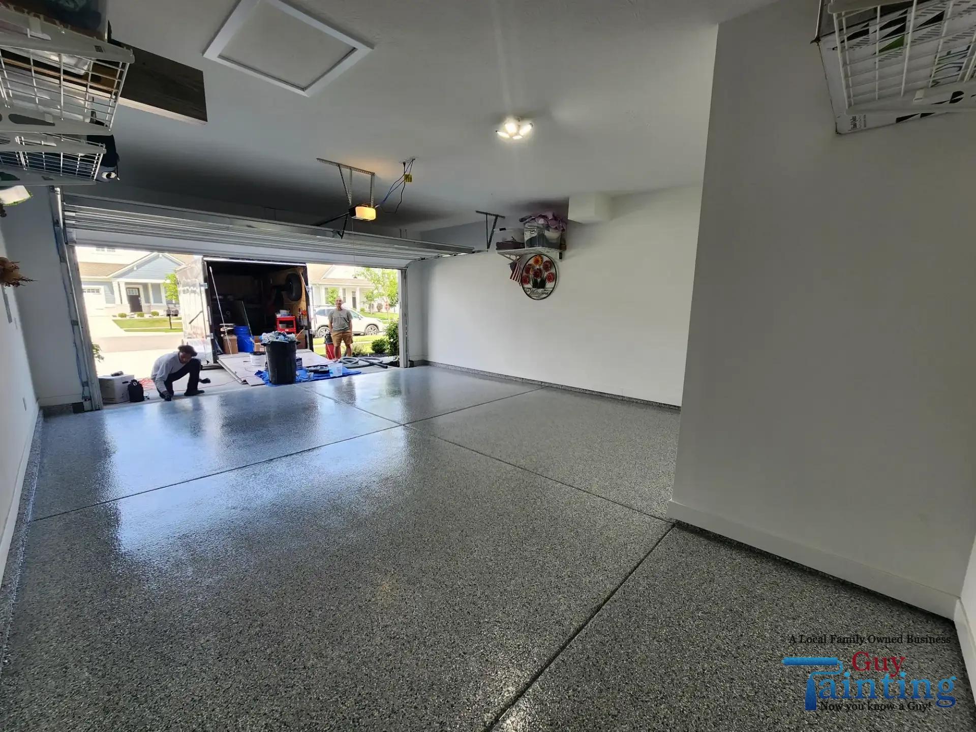 Freshly coated garage floor with Color Tidal Wave speckle finish, area 2