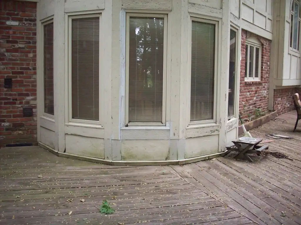 Damaged wood window sash before restoration