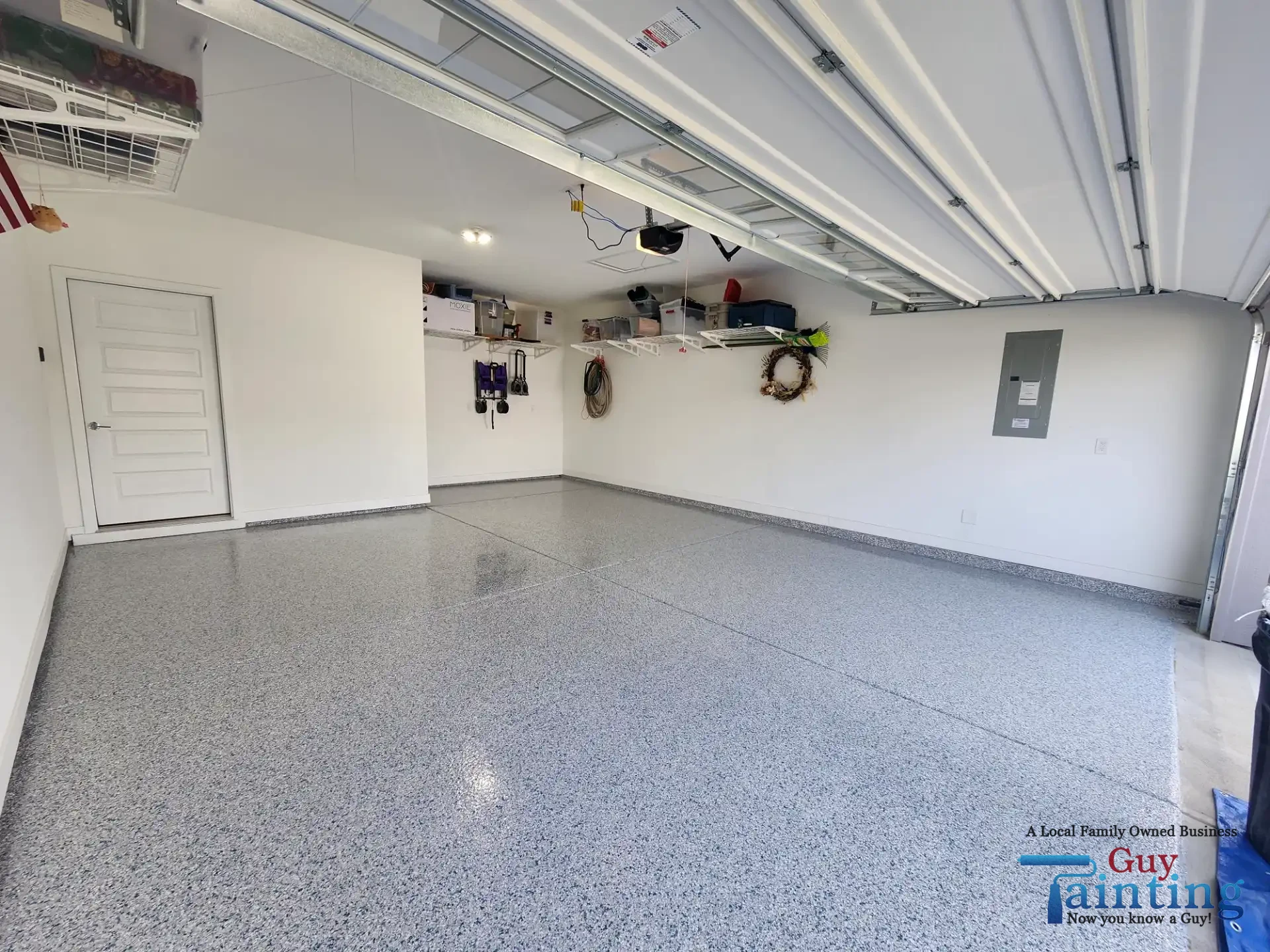 Freshly coated garage floor with Color Tidal Wave speckle finish, area 4