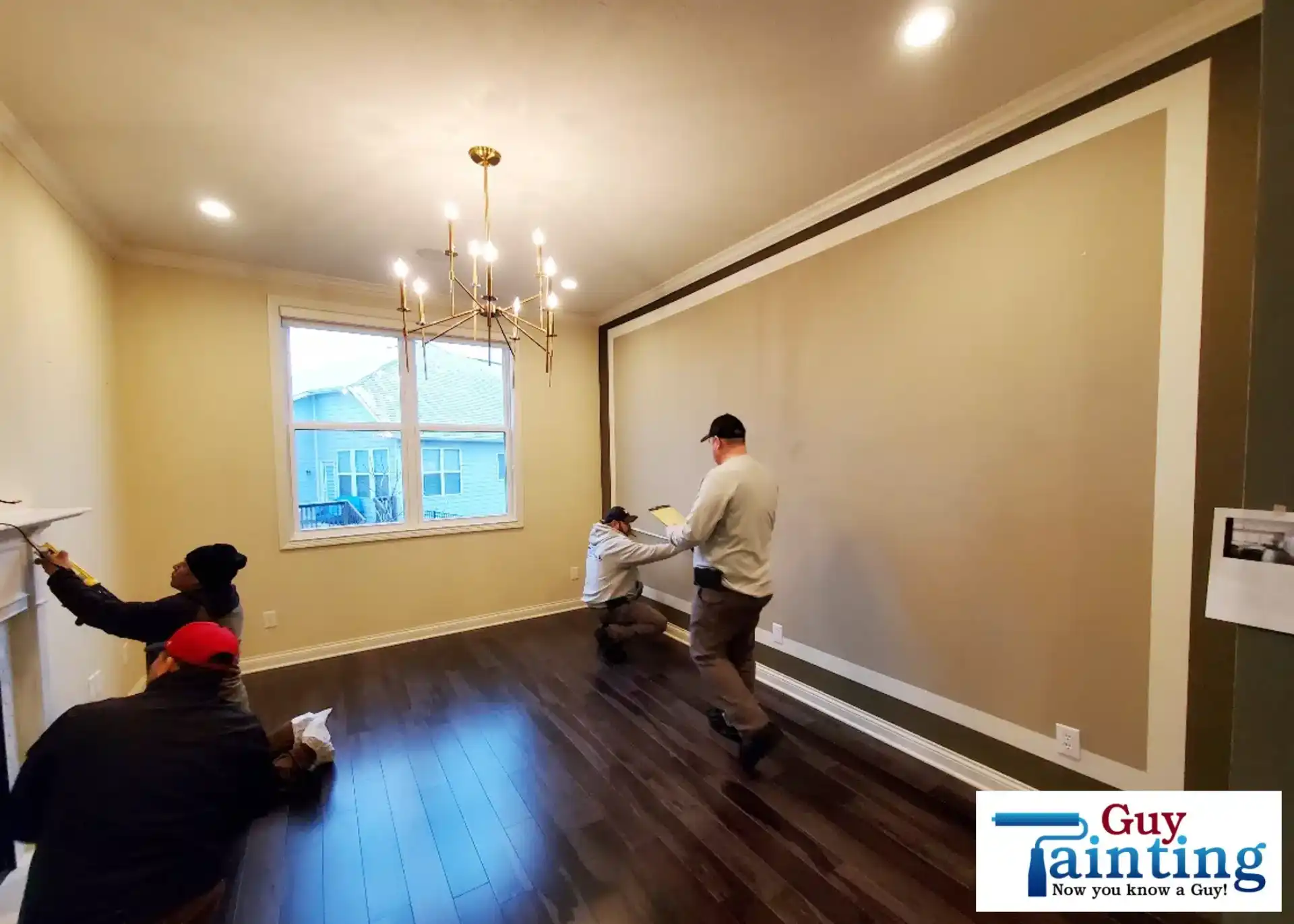 Dining room wall painted a warm off-white before decorative trim installation