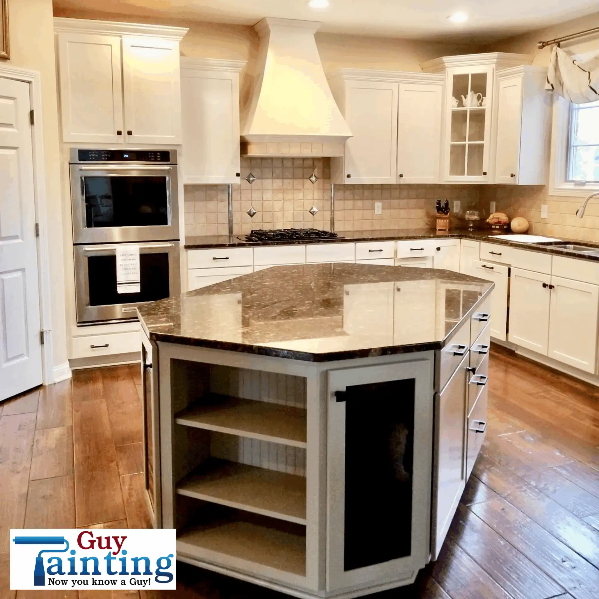 Two-tone kitchen cabinets painted in cream and warm taupe